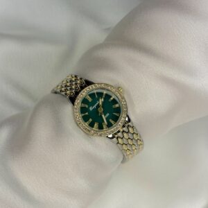 TIMELESS CIRCULAR GOLD & SILVER WATCH
