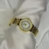 TIMELESS CIRCULAR GOLD WATCH