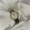TIMELESS CIRCULAR GOLD & SILVER WATCH